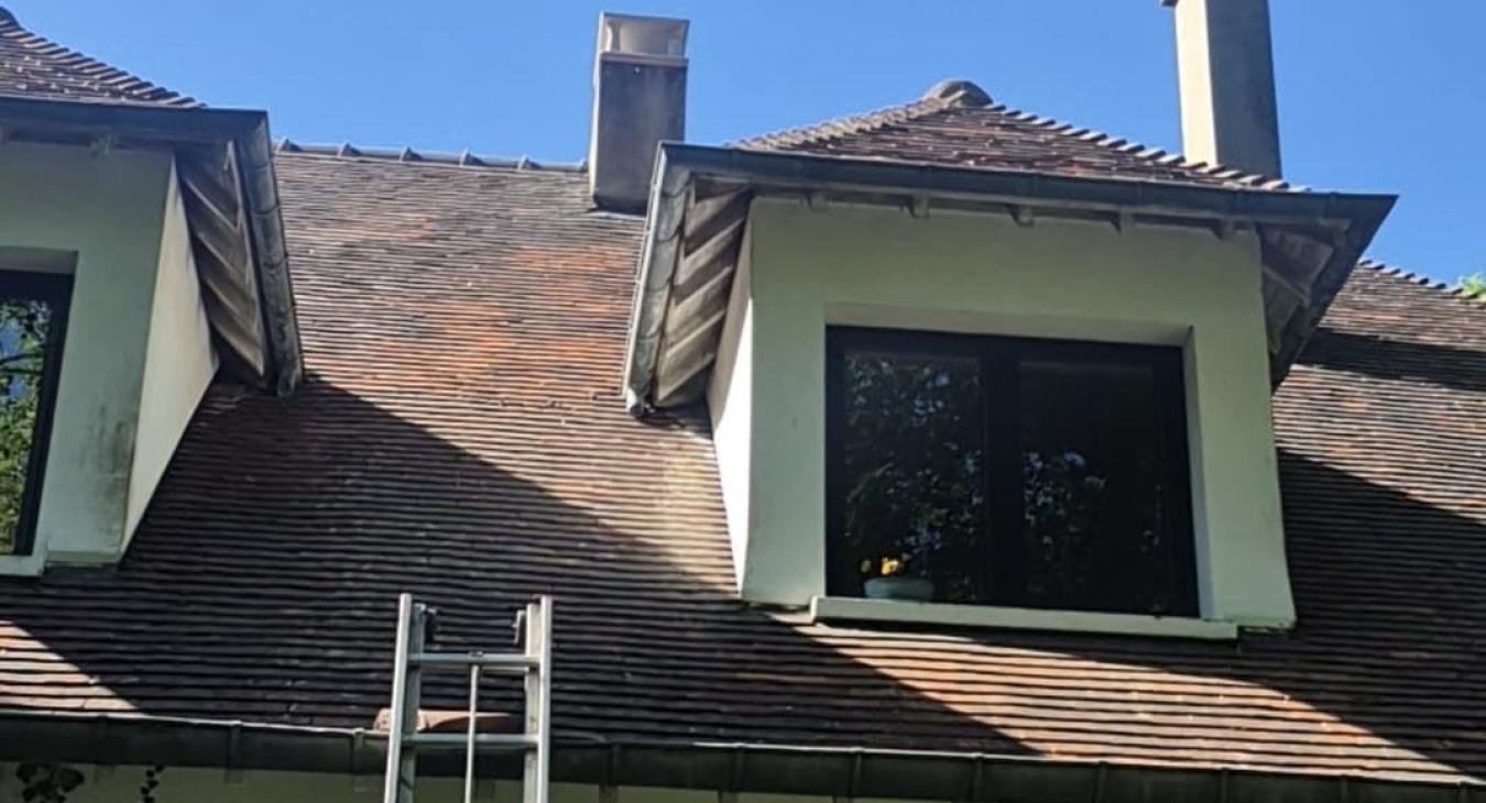 Installation d'un chapeau de cheminée